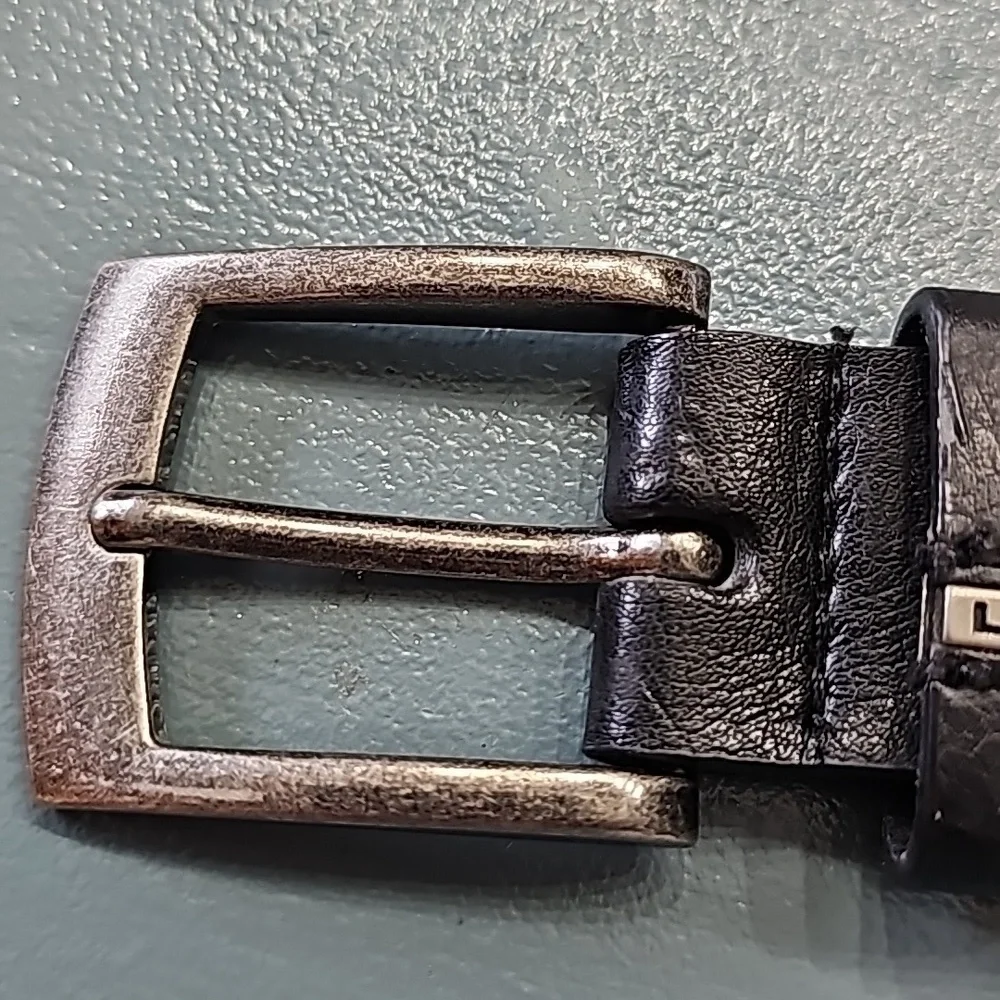 Levi's black‎ with silver buckle large belt. 31-32.